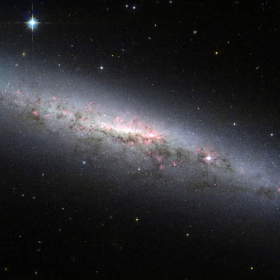 Hubble image of edge-on spiral galaxy NGC 7090