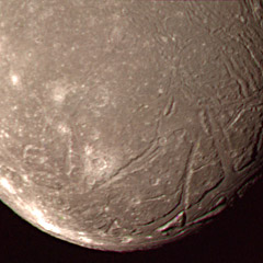Voyager 2 view of Ariel craters and rift valleys
