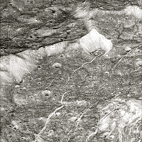Cassini close-up image of Dione showing fractured terrain 