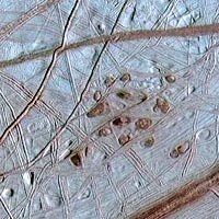 Galileo view of Europa showing dark spots known as lenticulae